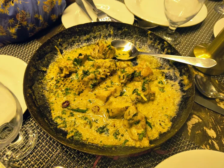Chicken karahi in a black pan